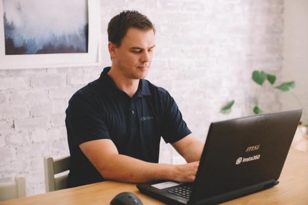 Web Design Company - Man working on Laptop in office
